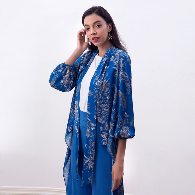 T058 女士花卉印花半高领灯笼袖不对称下摆衬衫